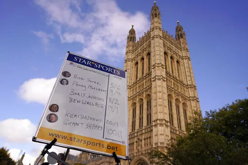 A bookmakers board shows the odds for the next British Prime Minister after Liz Truss resigned in London, Thursday, Oct. 20, 2022. Truss resigned Thursday, bowing to the inevitable after a tumultuous, short-lived term in which her policies triggered turmoil in financial markets and a rebellion in her party that obliterated her authority.(AP Photo/Alberto Pezzali)
