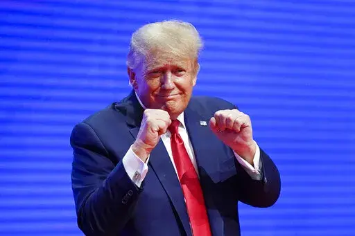 Former President Donald Trump, acknowledges supports after speaking at the Conservative Political Action Conference (CPAC) Saturday, Feb. 26, 2022, in Orlando, Fla. (AP Photo/John Raoux)