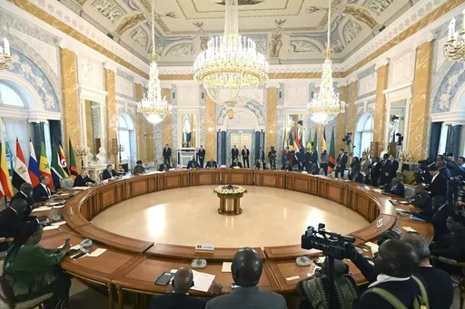 In this handout photo provided by Photo host Agency RIA Novosti, Russian President Vladimir Putin, at left, attends a meeting with a delegation of African leaders and senior officials in St. Petersburg, Russia, Saturday, June 17, 2023. By halting a landmark deal that allowed Ukrainian grain exports via the Black Sea, Putin has taken a risky gamble that could badly damage Moscow's relations with many of its partners that have remained neutral or even supportive of the Kremlin amid the war in Ukra
