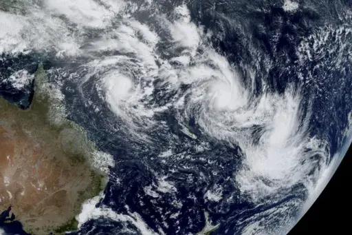 In this satellite image provided by CSU/CIRA & NOAA taken 1:10 GMT on Feb. 25, 2025, shows three cyclones, from left, Alfred, Seru and Rae east of Australia in the South Pacific. (CSU/CIRA & NOAA via AP, File)