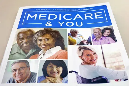 In this Nov. 8, 2018 file photo, the U.S. Medicare Handbook is photographed in Washington. Many people choose Medicare Advantage plans without exploring their options or noticing what changes their plan may have made, according to research. But now that a new year has started, you may realize you picked the wrong plan during Medicare’s fall open enrollment. (AP Photo/Pablo Martinez Monsivais)