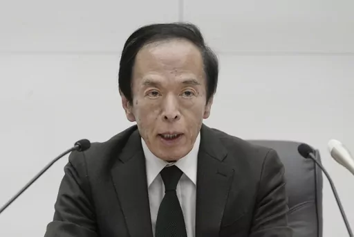 Kazuo Ueda, the governor of the Bank of Japan speaks during a press conference at the bank headquarters in Tokyo, Japan Tuesday, March 19, 2024. Japan’s central bank raised its benchmark interest rate Tuesday for the first time in 17 years, ending a longstanding policy of negative rates meant to boost the economy. (Kyodo News via AP)