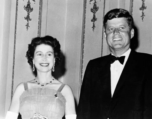Queen Elizabeth II and U.S. President John Kennedy as they pose at Buckingham Palace in London, June 5, 1961. The Kennedy's were dinner guests of the Queen. Queen Elizabeth II, Britain's longest-reigning monarch and a rock of stability across much of a turbulent century, died Thursday, Sept. 8, 2022, after 70 years on the throne. She was 96. (AP Photo, File)