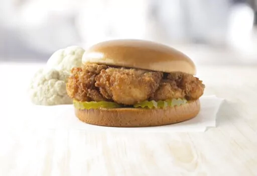 This image released by Chick-fil-A, Inc. shows the new, plant based, Chick-fil-A Cauliflower Sandwich. (Chick-fil-A, Inc. via AP)