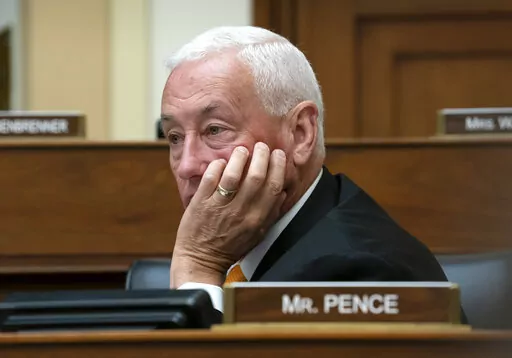 Rep. Greg Pence, R-Ind., listens as the House Foreign Affairs Committee holds a hearing titled, "The Betrayal of our Syrian Kurdish Partners," an examination of President Donald Trump's abrupt decision to withdraw from Syria and its impact on the Kurds and stability in the region, on Capitol Hill in Washington, Wednesday, Oct. 23, 2019. He is the brother of Vice President Mike Pence. (AP Photo/J. Scott Applewhite)