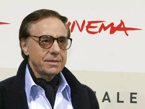 U.S. film director, writer and actor Peter Bogdanovich poses during a photo call for the presentation of the movie "The Dukes" at the Rome Film Festival in Rome on Oct. 23, 2007.  Bogdanovich, the Oscar-nominated director of "The Last Picture Show," and "Paper Moon," died Thursday, Jan. 6, 2022 at his home in Los Angeles. He was 82.  (AP Photo/Sandro Pace, File)
