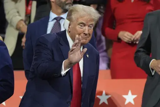 Republican presidential candidate former President Donald Trump appears during the Republican National Convention Monday, July 15, 2024, in Milwaukee. (AP Photo/Paul Sancya)