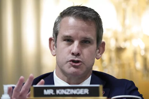 Rep. Adam Kinzinger, R-Ill., speaks as the House select committee investigating the Jan. 6 attack on the U.S. Capitol Hill in Washington on Dec. 19, 2022. The Open Field, a Penguin Random House imprint overseen by Maria Shriver, announced Tuesday that Kinzinger’s “Renegade: My Life in Faith, the Military, and Defending America from Trump’s Attack on Democracy” is scheduled for on release Oct. 17. (AP Photo/Jacquelyn Martin, File)