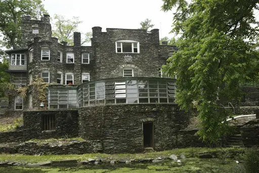 This May 5, 2004 photo shows the Tiedemann Castle in Greenwood Lake, N.Y., owned by former New York Yankees star Derek Jeter. Jeter has found a potential buyer for his New York castle after the sprawling lakefront property had its price tag slashed by more than half. The property, known as Tiedemann Castle, went into contract with a buyer in late May 2024, after the asking price was lowered to $6.3 million. It was first listed around about six years ago for more than $14 million and had at one p