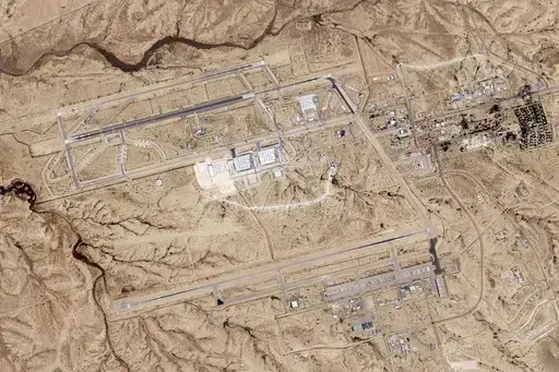 This satellite photo taken by Planet Labs PBC shows Israel's Nevatim air base on Friday, April 19, 2024. An Iranian attack on an Israeli desert air base as part of Tehran's unprecedented assault on the country damaged a taxiway, a satellite image analyzed by The Associated Press on Saturday shows. (Planet Labs PBC via AP)