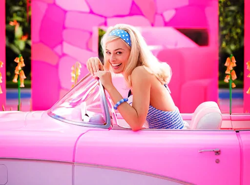 This image released by Warner Bros. Pictures shows Margo Robbie in character in the film "Barbie," releasing summer 2023. (Jaap Buitendijk/Warner Bros. Pictures via AP)