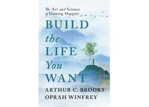 This cover image released by Portfolio Books shows “Build the Life You Want: The Art and Science of Getting Happier,” by Arthur C. Brooks and Oprah Winfrey, to be published Sept. 12 by Portfolio Books (Portfolio Books via AP)