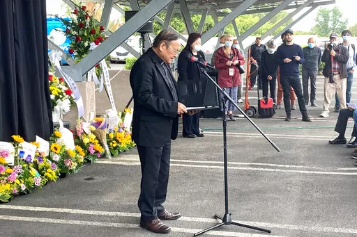 Pastor Albany Lee addresses congregants and community members on Saturday, May 21, 2022, as survivors and church leaders join in prayer and thank community members for their support nearly a week after a deadly shooting at a Taiwanese American church congregation in Laguna Woods, Calif. The community is reeling after the attack on a luncheon of the Irvine Taiwanese Presbyterian Church that killed one and wounded five. Lee said trauma specialists will be available to assist community members. (AP