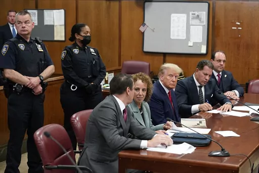 Former President Donald Trump sits at the defense table with his legal team in a Manhattan court, Tuesday, April 4, 2023, in New York. Trump's lawyers are demanding that the judge in his New York City criminal case step aside, echoing the former president's complaints that he's "a Trump hating-judge" with a family full of "Trump haters." Trump's lawyers said June 2, that Judge Juan Manuel Merchan has shown anti-Trump bias in previous cases related to the businessman-turned-politician. (AP Photo/