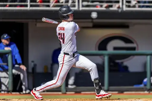Georgia outfielder Charlie Condon (24) watches his hit during an NCAA college baseball game Sunday, Feb. 18, 2024, in Athens, Ga. The field for the NCAA baseball tournament will take shape this week with conference tournaments determining most of the 30 automatic qualifiers. (AP Photo/Jason Allen, File)