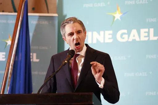 Simon Harris speaks after being confirmed as the new leader of Fine Gael, paving the way for him to become Ireland's youngest premier, in Athlone, Ireland, Sunday March 24, 2024. Ireland is poised to get its youngest-ever premier after Simon Harris secured the leadership of the Fine Gael party on Sunday, He replaces Leo Varadkar who announced his surprise resignation last week. (Eamon Ward/PA via AP)