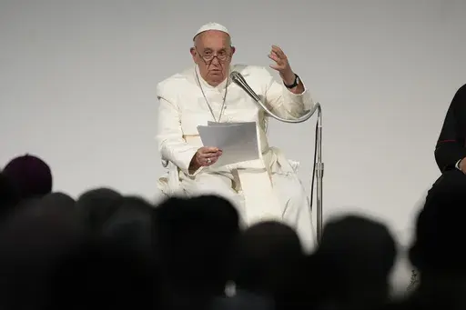 Pope Francis attends a meeting with the participants of the 50th Social Week of Catholics in Italy, in Trieste, Italy, on July 7, 2024. The Vatican’s chief prosecutor has strongly defended the integrity and fairness of the city state’s justice system, amid criticism that Pope Francis' absolute power and his interventions in the recently-concluded “trial of the century” violated the defendants’ fundamental rights. (AP Photo/Alessandra Tarantino, File)