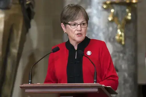 Kansas Gov. Laura Kelly speaks at the dedication and unveiling ceremony of a statue in honor of Amelia Earhart in Statuary Hall, at the Capitol in Washington, July 27, 2022. Kelly wasted little time after a decisive victory in Kansas for abortion rights before sending out a national fundraising email warning that access to the procedure would be “on the chopping block” if her party did not win in the November elections. (AP Photo/J. Scott Applewhite, File)