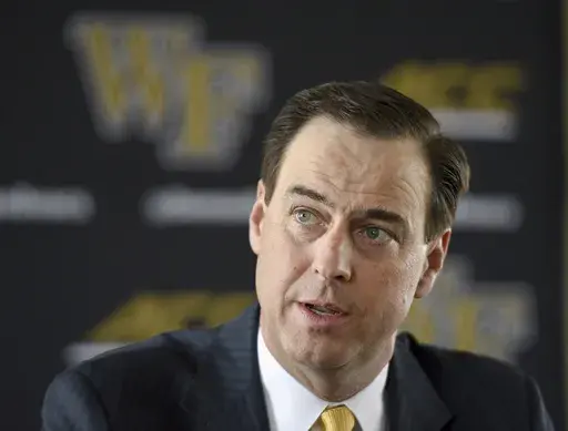 In this May 6, 2019, file photo, Wake Forest athletic director John Currie talks with the media in Winston-Salem, N.C. (Walt Unks/The Winston-Salem Journal via AP, File)