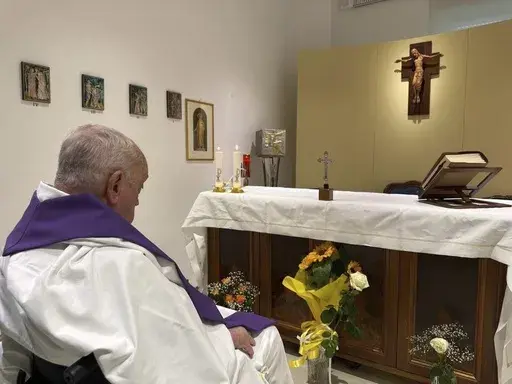This picture released by the Vatican Press Office shows Pope Francis concelebrating a mass inside his private chapel att the Agostino Gemelli Polyclinic in Rome on Sunday, March 16, 2025. (Vatican Press Office, Via AP )