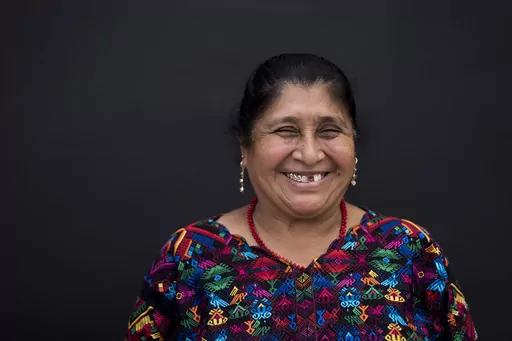 María Rosita Yoc Suruy poses for portraits in San Juan Comalapa, Guatemala, Tuesday, June 20, 2023. The 56-year-old homemaker said she planned to vote in the presidential race on June 25, though she had not entirely decided who to vote for. (AP Photo/Moises Castillo)