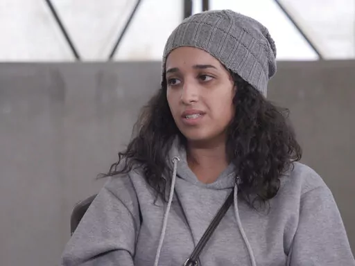 In this image taken from video Hoda Muthana talks during an interview in Roj detention camp in Syria where she is being held by U.S.-allied Kurdish forces, Wednesday, Nov. 9, 2022. Muthana, who ran away from home in Alabama at the age of 20, joined the Islamic State group and had a child with one of its fighters says she still hopes to return to the United States, serve prison time if necessary, and advocate against the extremists. (AP Photo/The News Movement)