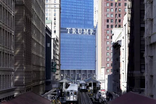 The Trump International Hotel and Tower is seen looking north on Wabash Ave. in Chicago's famed Loop, on Sept. 17, 2014. A Manhattan judge said Thursday, Nov. 3, 2022, that he will appoint an independent monitor for former President Donald Trump’s real estate empire, restricting his company's ability to freely make deals, sell assets and change its corporate structure. (AP Photo/Charles Rex Arbogast, File)