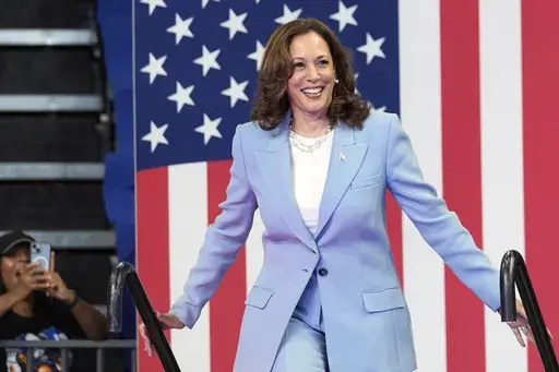Vice President Kamala Harris arrives to speak during a campaign rally, July 30, 2024, in Atlanta. Harris, the daughter of immigrants who rose through the California political and law enforcement ranks to become the first female vice president in U.S. history, is poised to secure the Democratic Party's presidential nomination Monday, Aug. 5, 2024. (AP Photo/John Bazemore)