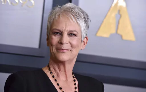 Jamie Lee Curtis appears at the Governors Awards in Los Angeles on Nov. 19, 2022. Curtis is this year's recipient of AARP The Magazine's Movies for Grownups Awards career achievement honor. The group announced Thursday that Curtis is receiving the honor at the AARP's annual Best Movies and TV for Grownups ceremony. The event is hosted by returning host Alan Cumming and is premiering on PBS on Feb. 17, 2023, at 9 p.m. E.T. (Photo by Jordan Strauss/Invision/AP, File)