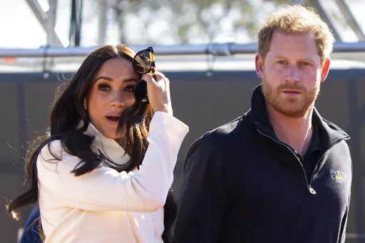 Prince Harry and Meghan Markle, Duke and Duchess of Sussex visit the track and field event at the Invictus Games in The Hague, Netherlands, Sunday, April 17, 2022. Prince Harry and his wife, Meghan, have been asked to vacate their home in Britain. Frogmore Cottage, located on the grounds of Windsor Castle west of London, had been intended as the couple’s main residence before they gave up royal duties and moved to Southern California. (AP Photo/Peter Dejong, File)
