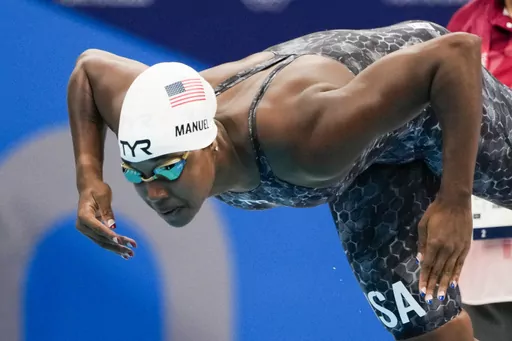 Simone Manuel, of United States, swims in a women's 50-meter freestyle heat at the 2020 Summer Olympics, Friday, July 30, 2021, in Tokyo, Japan. The Soul Cap has gotten the green light from swimming's top governing body, which figures to be a huge step toward bringing more diversity to a largely white sport. The oversized cap, which is designed to make it more comfortable for Black swimmers to hit the water with natural hair, will likely have its biggest influence at the grassroots level. That, 