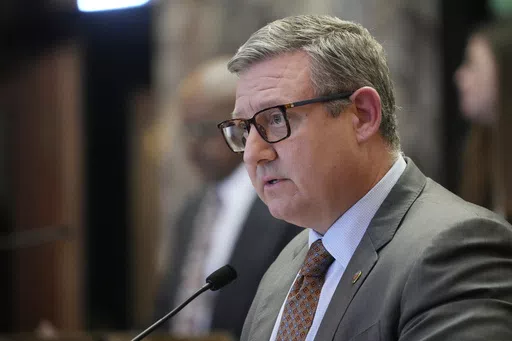 Mississippi State Senate Education Committee Chairman Sen. Dennis DeBar, R-Leakesville, presents a bill before legislators on the floor of the Senate chamber, Wednesday, April 3, 2024, at the Mississippi Capitol in Jackson, Miss. (AP Photo/Rogelio V. Solis)